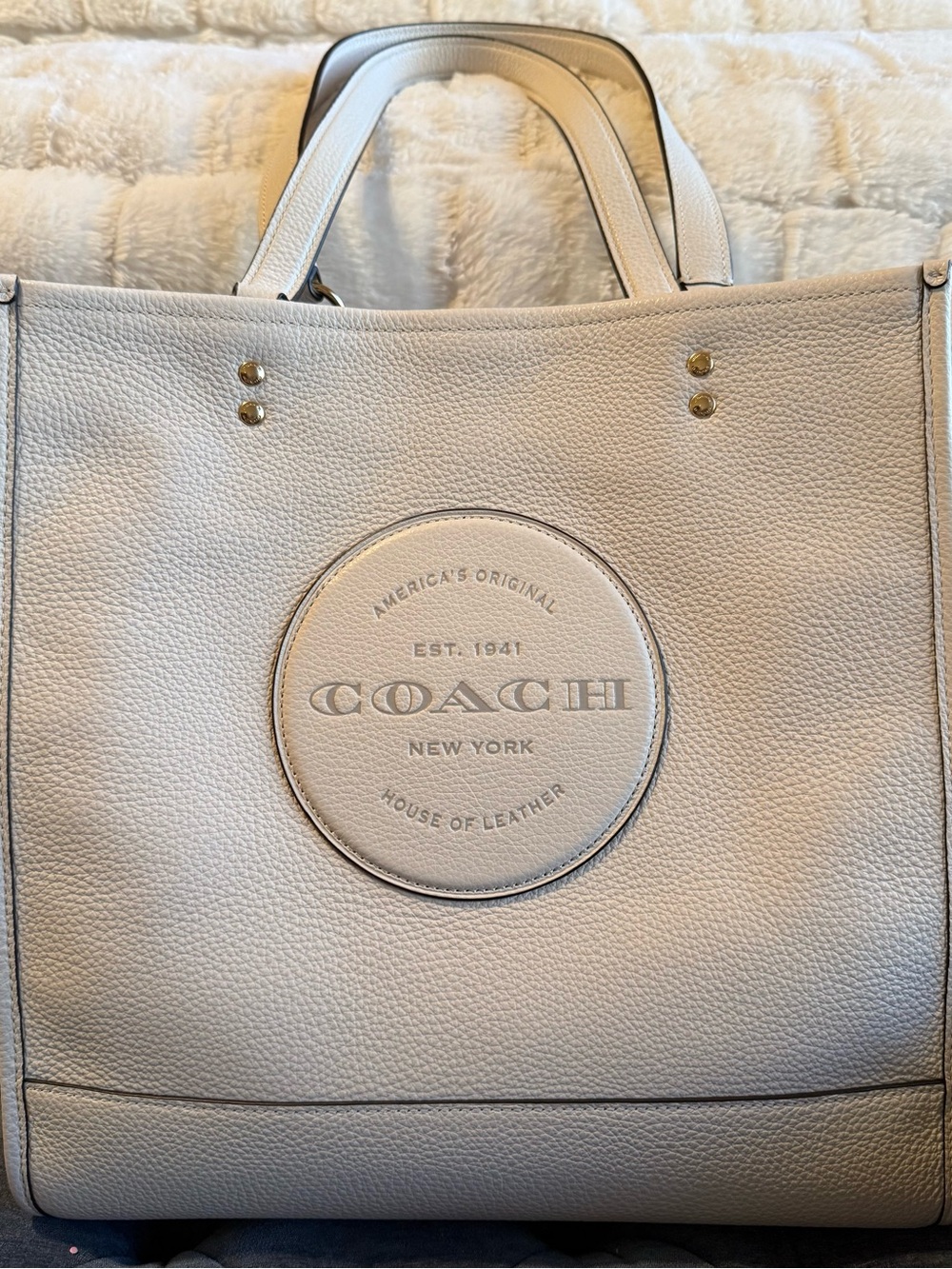 COACH Pebbled Leather Tote in Light Cream with Embossed Logo